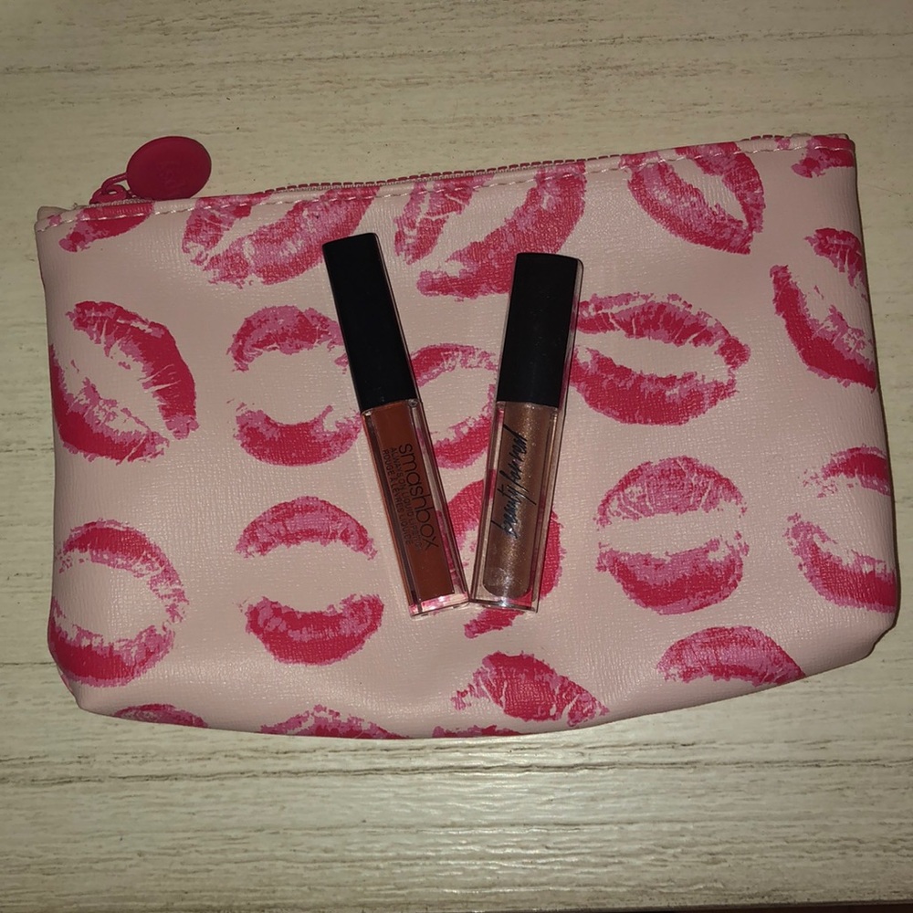 Lip gloss and lip stick with makeup bag